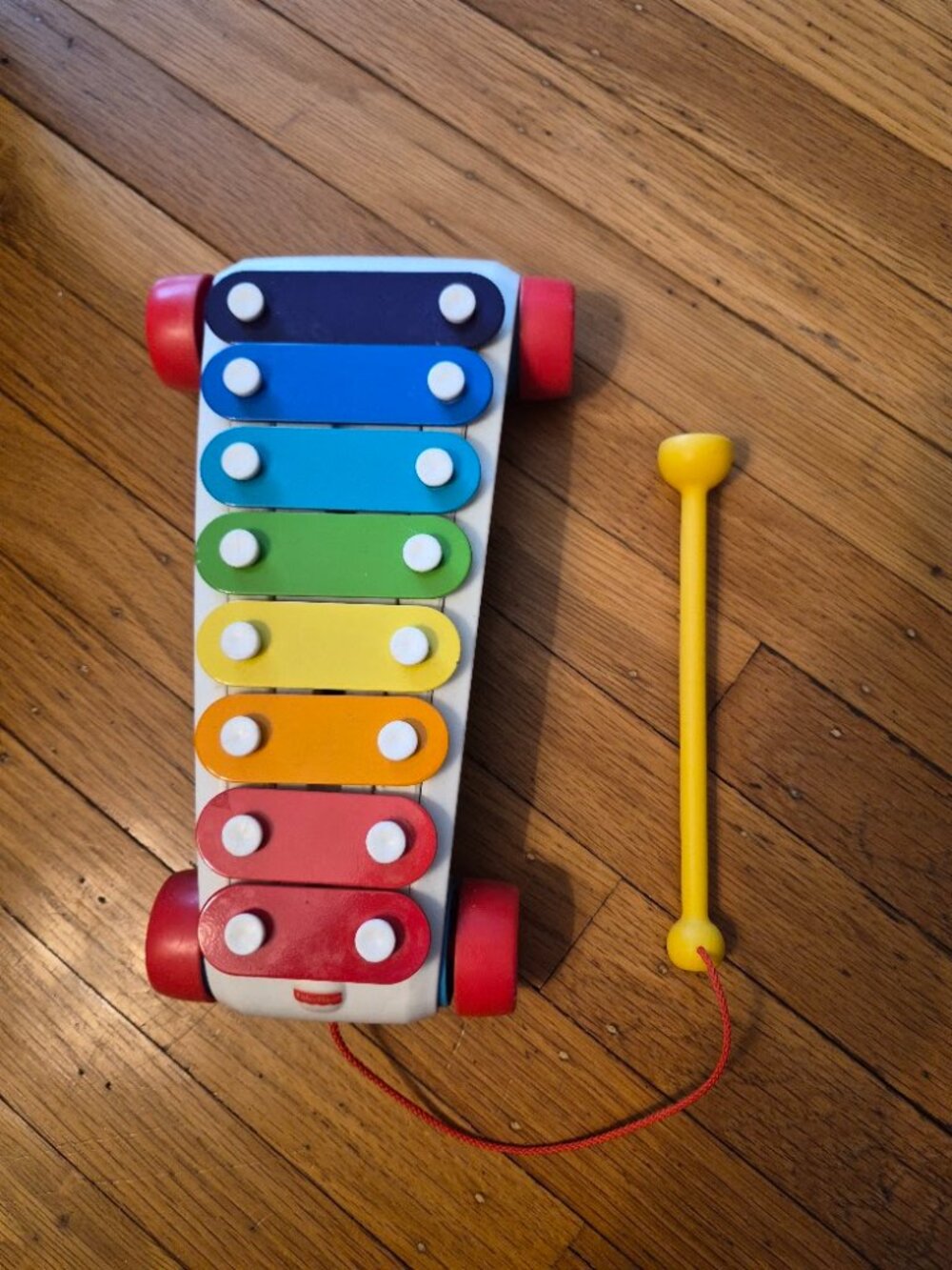 Fisher Price Baby xylophone toy with mallet and wheels